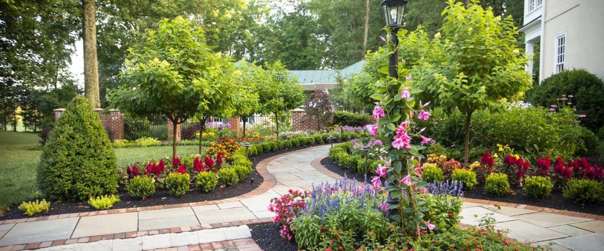 Balance And Beauty: The Perfect Pairing Of Hardscaping And Trees In Leesburg