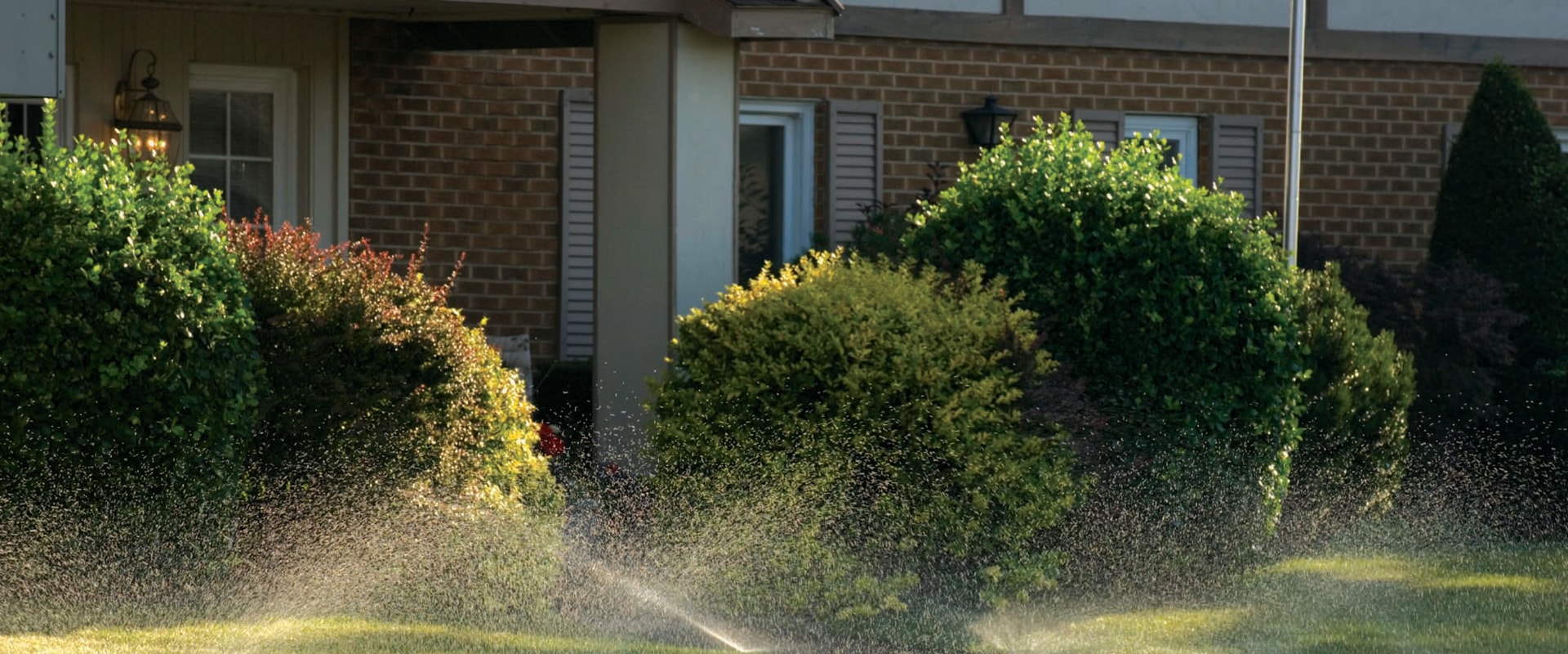Why You Might Need A Sprinkler System For Your Hardscape In Omaha